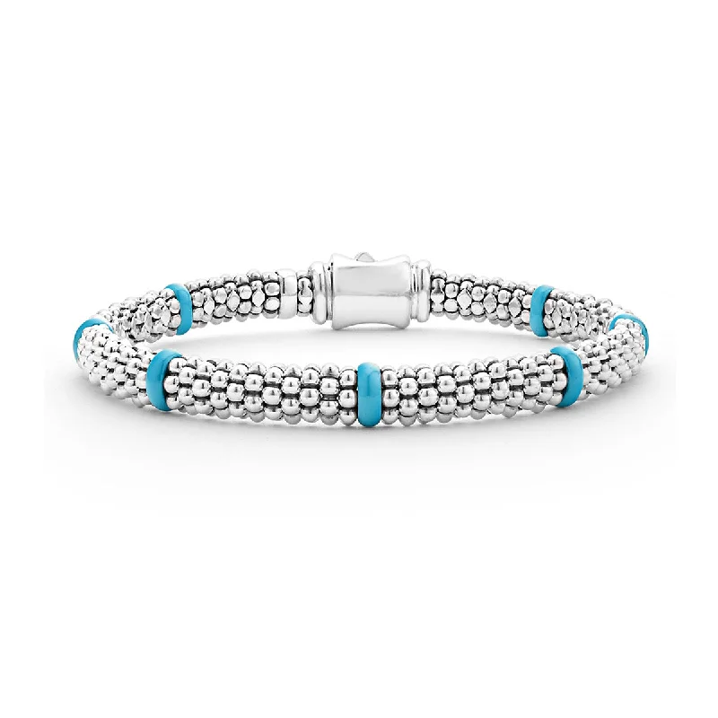 ladies-crystal-gold-bracelets-Light Blue Caviar 7 Station 6mm Beaded Rope Bracelet in Sterling Silver and Ceramic Size 7