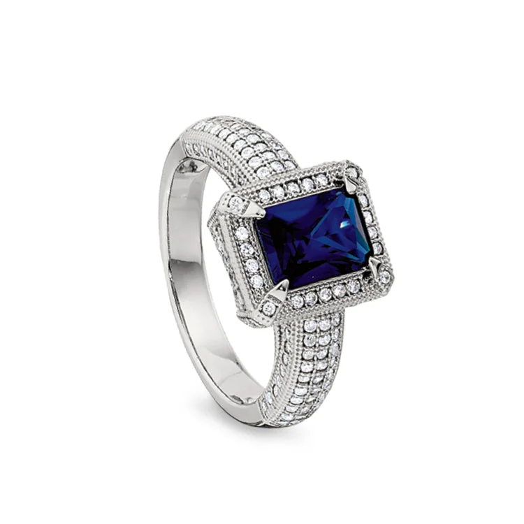 Ladies rings arched shine -Platinum Finish Sterling Silver Micropave Emerald Cut Synthetic Blue Sapphire Ring with Simulated Diamonds