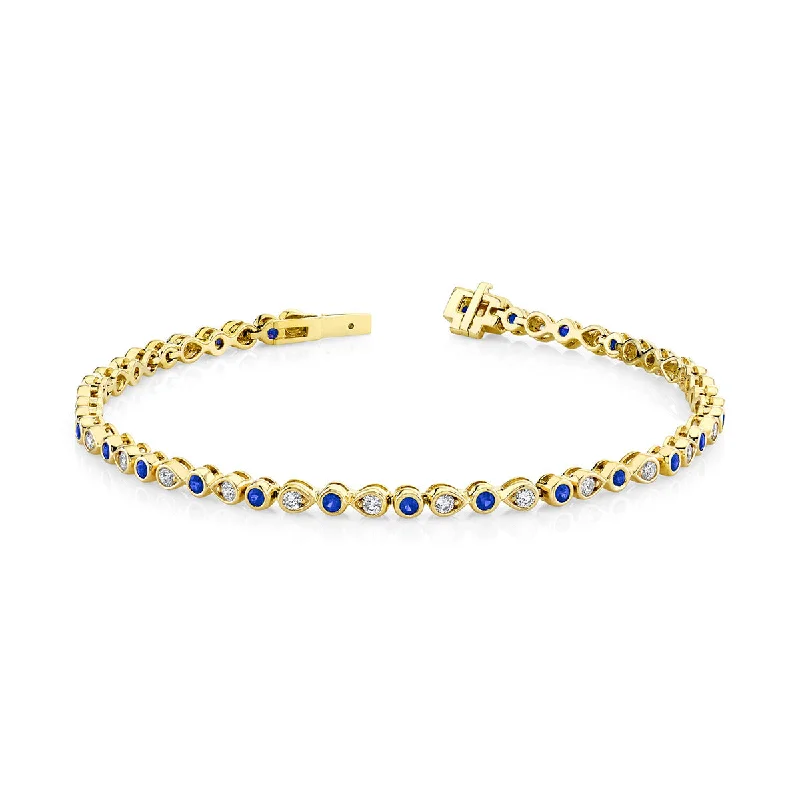 ladies-sterling-silver-multi-strand-bracelets-Blue Sapphire 14K Yellow Gold Bracelet with Diamonds