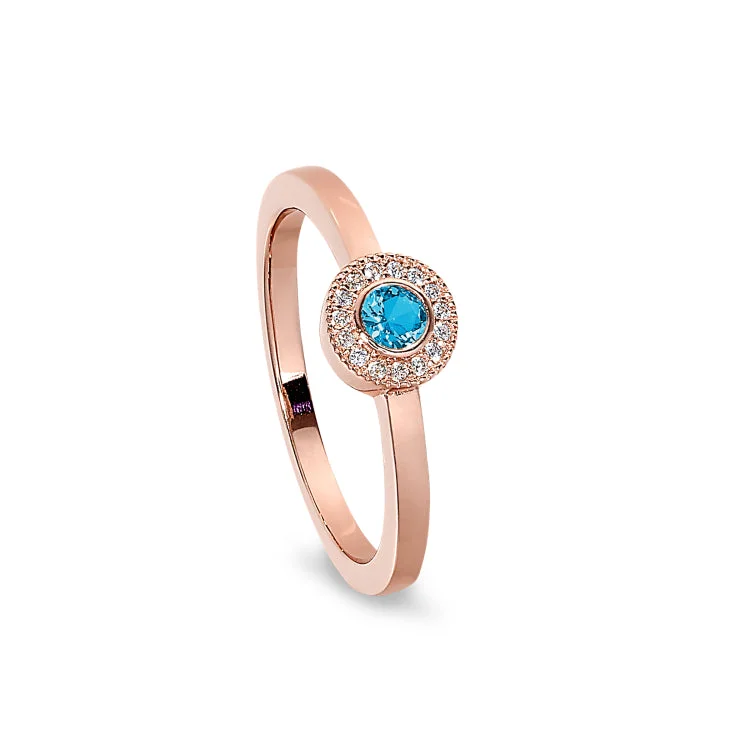 Ladies rings for country vibes -Rose Gold Finish Sterling Silver Micropave Round Simulated Blue Topaz Ring with Simulated Diamonds Size 7