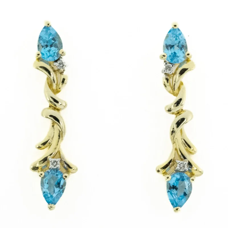 Ladies earrings for pioneer charm -Blue Topaz & Diamond Accented Dangle Earrings in 14K Yellow Gold