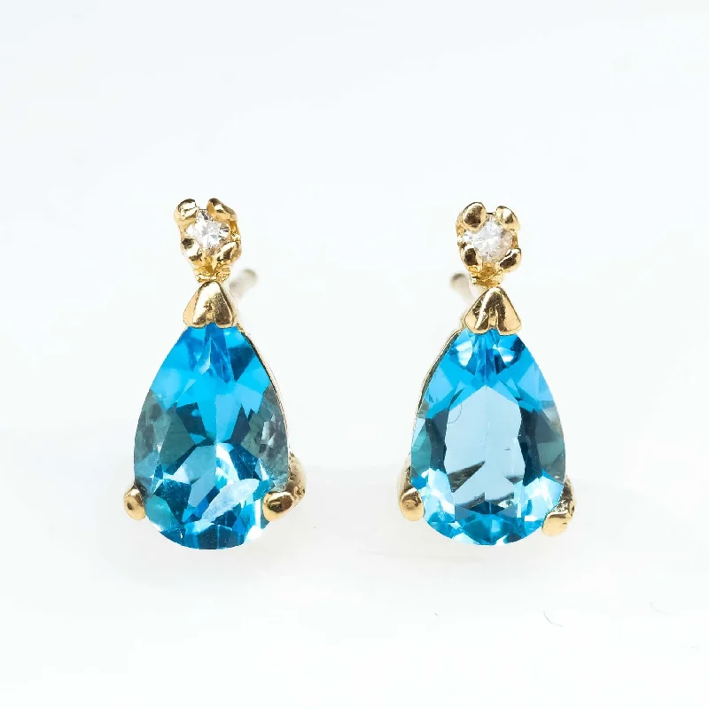 Ladies earrings titanium gleam -Blue Topaz and Diamond Drop Stud Earrings in 14K Yellow Gold