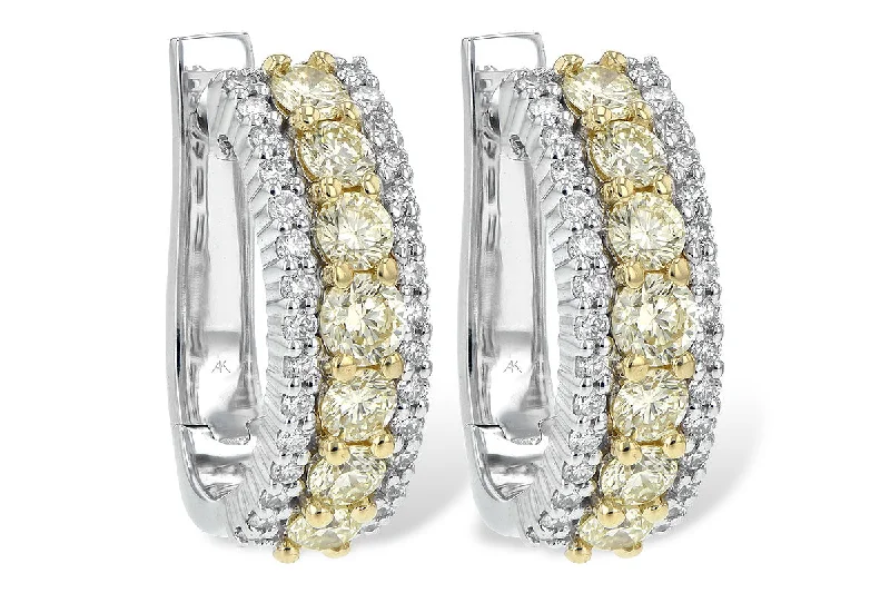 Ladies earrings futuristic flair -Yellow and White Diamond Huggie Earrings in White Gold by Allison Kaufman Co.