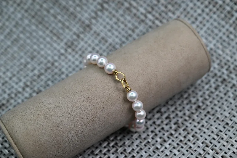 ladies-ethnic-wraparound-bracelets-White Cultured Pearl Strand Bracelet with 18k Double Claw Clasp