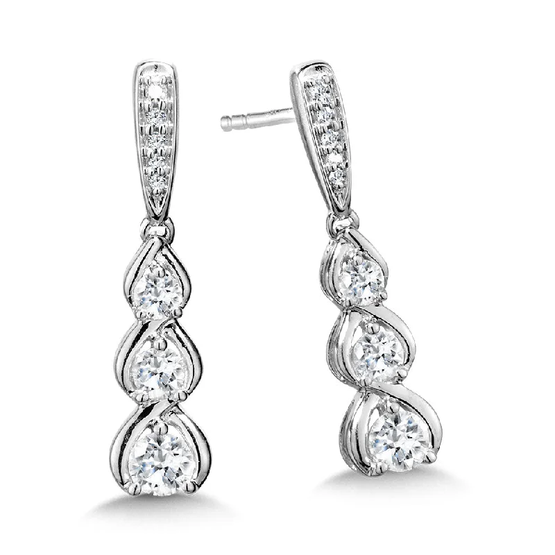 Ladies earrings with star elegance -Graduating Diamond Drop Earrings in White Gold