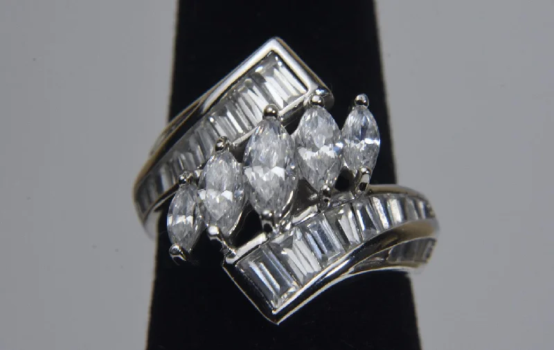 Ladies rings with orb shine -Ross-Simons - Sterling Silver Marquise and Baguette Cut Cubic Zirconia Ring - Size 6