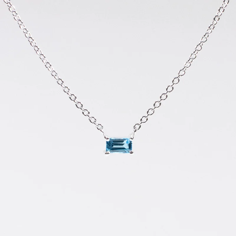 ladies-minimalist-multi-strand-necklaces-Silver Baguette Solitaire Blue Topaz Necklace